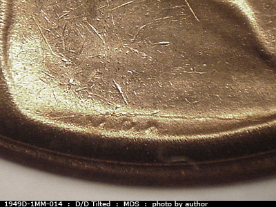 Die-stage B marker on 1949D•1MM•014 (1949 Repunched Mint Mark).