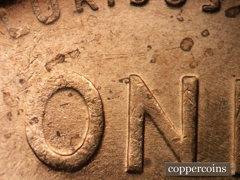 Die-stage B marker on 1949D•1MM•033 (1949 Repunched Mint Mark).