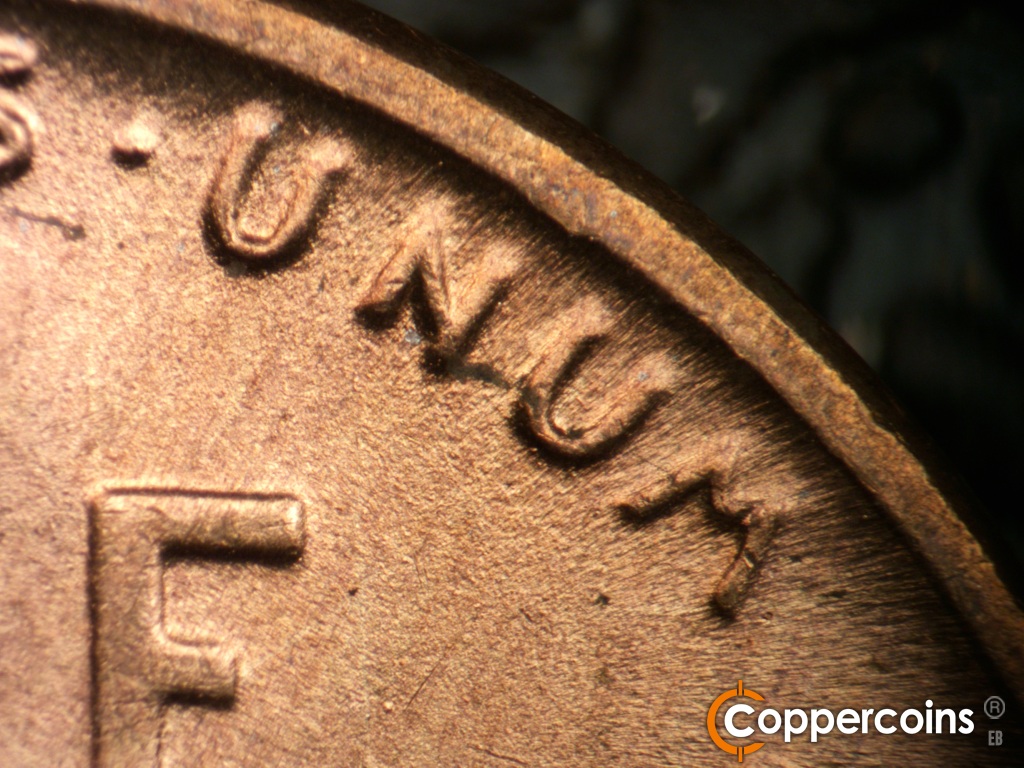 Die-stage B marker on 1949D•1MM•039 showing Closeup of UNUM.