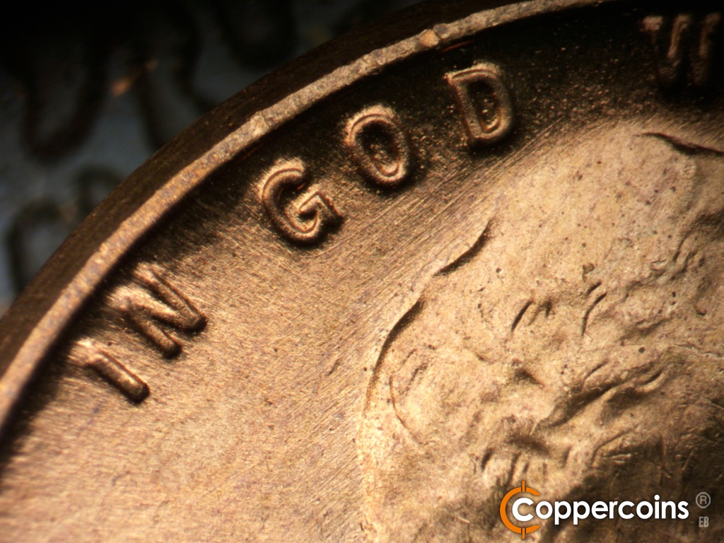Die-stage B marker on 1949D•1MM•040 showing NE die scratches under GOD.