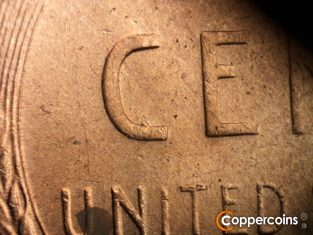 Die-stage B marker on 1949D•1MM•040 showing Very light SSW die scratches through C in CENT.