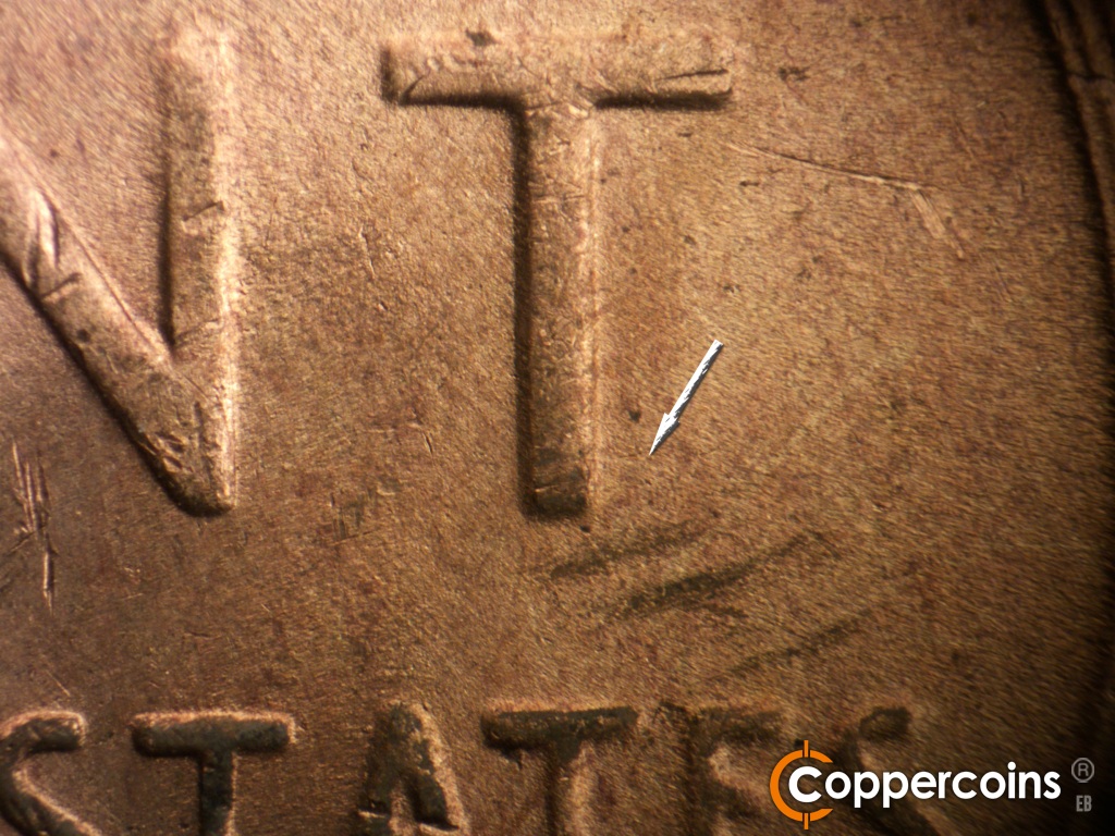Die-stage C marker on 1949D•1MM•042 showing Light ESE die scratch from bottom of T n CENT.