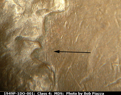 Die-stage B marker on 1949P•1DO•001 (1949 Doubled Die Obverse).