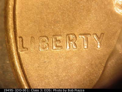 Die-stage A marker on 1949S•1DO•001 (1949 Doubled Die Obverse).