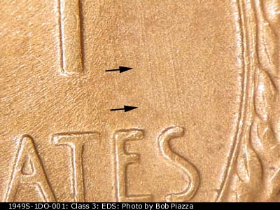 Die-stage A marker on 1949S•1DO•001 (1949 Doubled Die Obverse).
