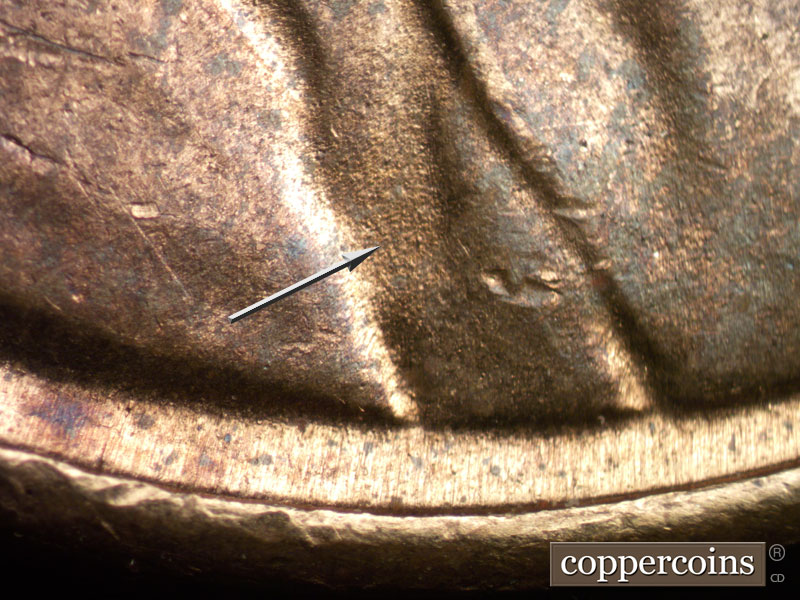 Die-stage B marker on 1949S•1DO•001 (1949 Doubled Die Obverse).