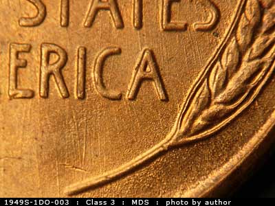 Die-stage B marker on 1949S•1DO•003 (1949 Doubled Die Obverse).
