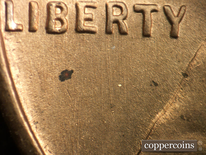 Die-stage B marker on 1949S•1DO•004 (1949 Doubled Die Obverse).