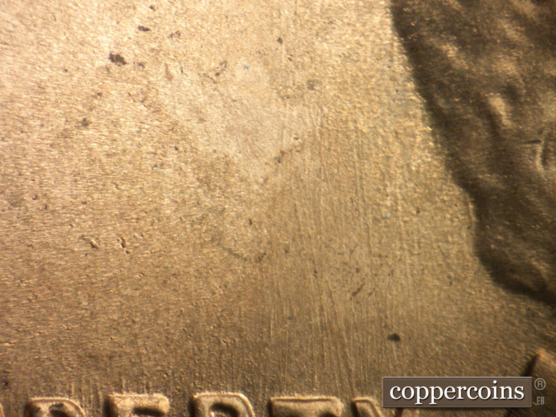 Die-stage B marker on 1949S•1DO•004 (1949 Doubled Die Obverse).