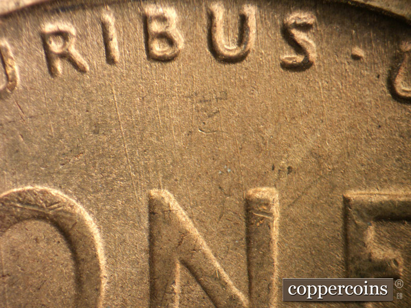Die-stage B marker on 1949S•1DO•004 (1949 Doubled Die Obverse).