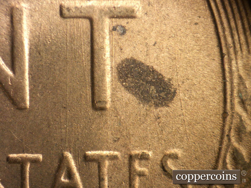 Die-stage B marker on 1949S•1DO•004 (1949 Doubled Die Obverse).