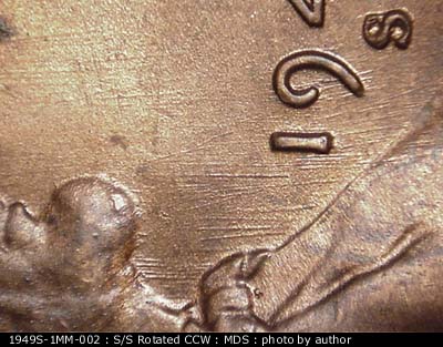 Die-stage B marker on 1949S•1MM•002 (1949 Repunched Mint Mark).