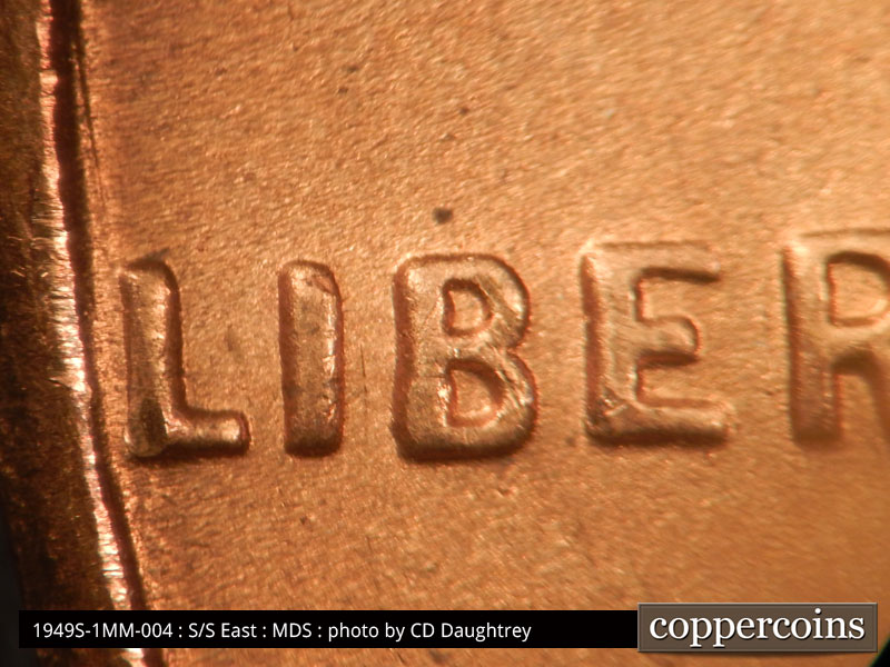 Die-stage B marker on 1949S•1MM•004 (1949 Repunched Mint Mark).