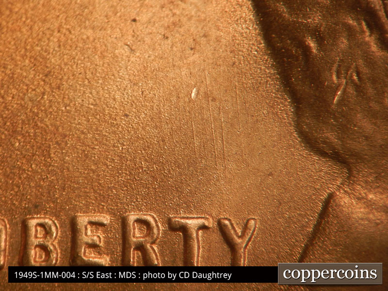 Die-stage B marker on 1949S•1MM•004 (1949 Repunched Mint Mark).