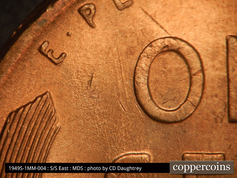 Die-stage B marker on 1949S•1MM•004 (1949 Repunched Mint Mark).