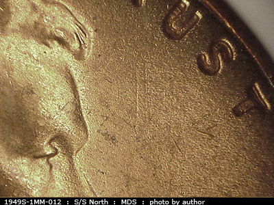 Die-stage B marker on 1949S•1MM•012 (1949 Repunched Mint Mark).