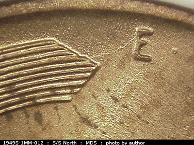 Die-stage B marker on 1949S•1MM•012 (1949 Repunched Mint Mark).