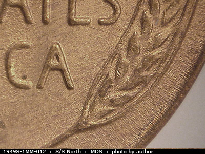 Die-stage B marker on 1949S•1MM•012 (1949 Repunched Mint Mark).