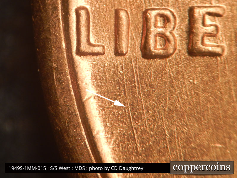 Die-stage B marker on 1949S•1MM•015 (1949 Repunched Mint Mark).