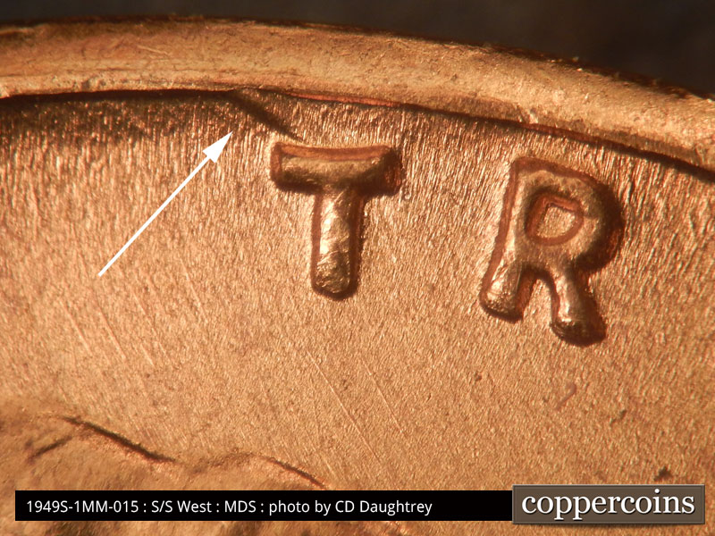 Die-stage B marker on 1949S•1MM•015 (1949 Repunched Mint Mark).