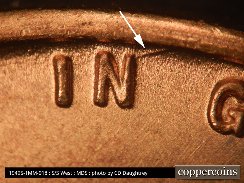 Die-stage B marker on 1949S•1MM•018 (1949 Repunched Mint Mark).