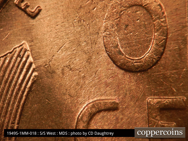 Die-stage B marker on 1949S•1MM•018 (1949 Repunched Mint Mark).