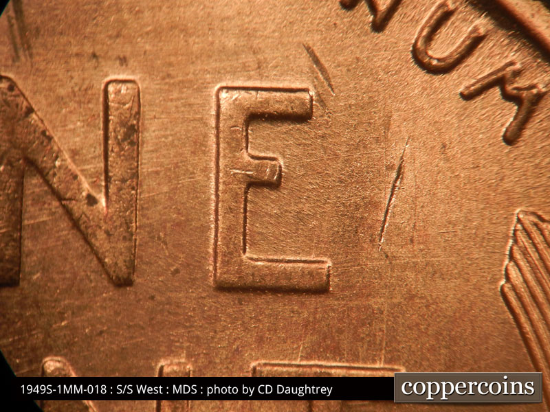Die-stage B marker on 1949S•1MM•018 (1949 Repunched Mint Mark).