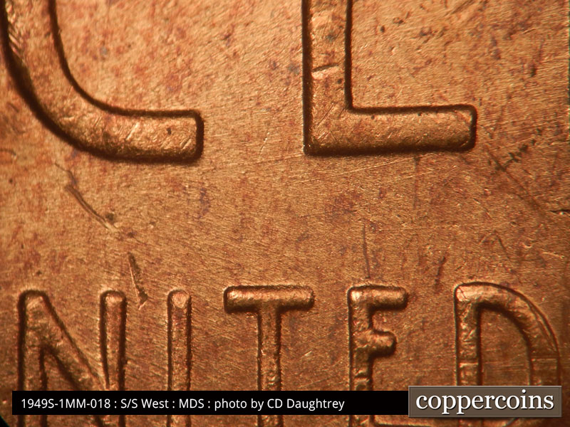 Die-stage B marker on 1949S•1MM•018 (1949 Repunched Mint Mark).