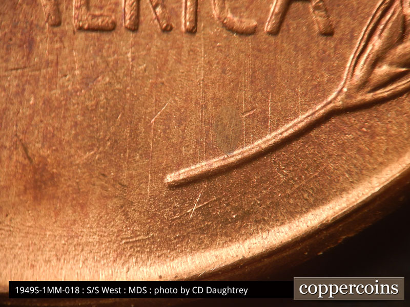 Die-stage B marker on 1949S•1MM•018 (1949 Repunched Mint Mark).