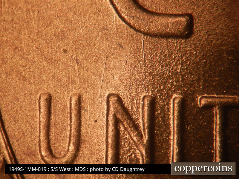 Die-stage B marker on 1949S•1MM•019 (1949 Repunched Mint Mark).