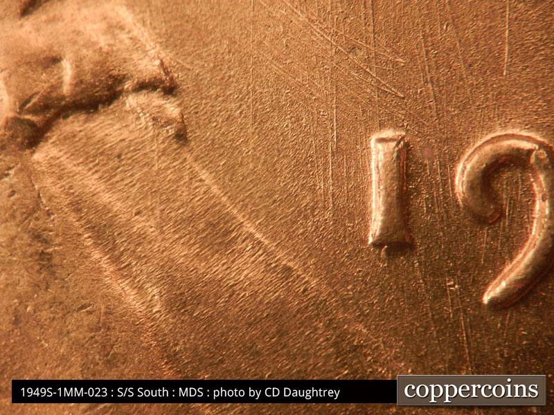 Die-stage B marker on 1949S•1MM•023 (1949 Repunched Mint Mark).