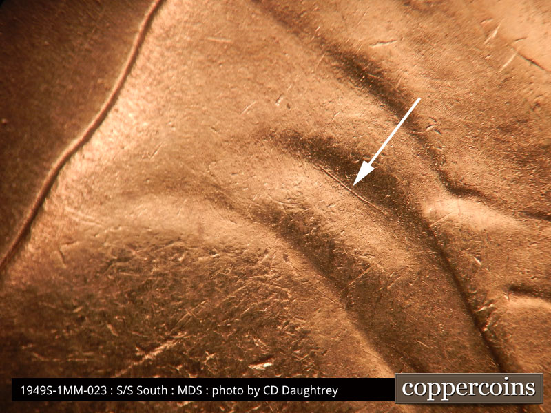 Die-stage B marker on 1949S•1MM•023 (1949 Repunched Mint Mark).