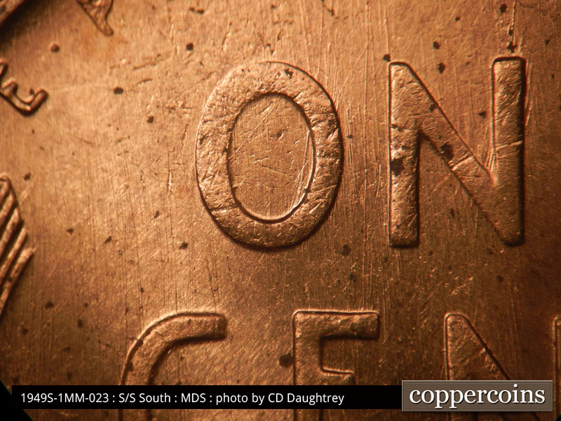 Die-stage B marker on 1949S•1MM•023 (1949 Repunched Mint Mark).