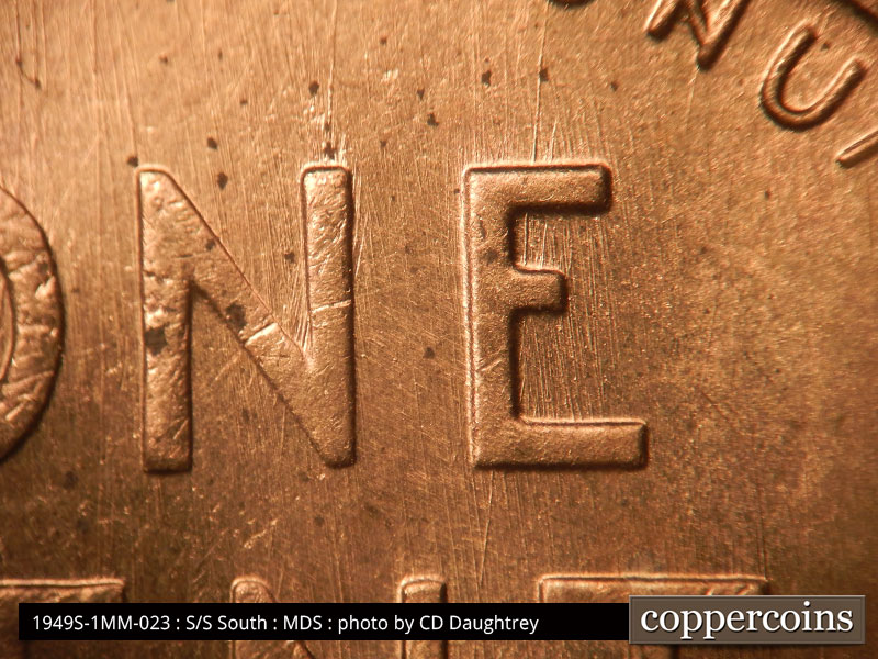 Die-stage B marker on 1949S•1MM•023 (1949 Repunched Mint Mark).