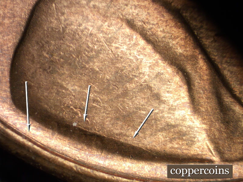 Die-stage B marker on 1949S•1MM•027 (1949 Repunched Mint Mark).
