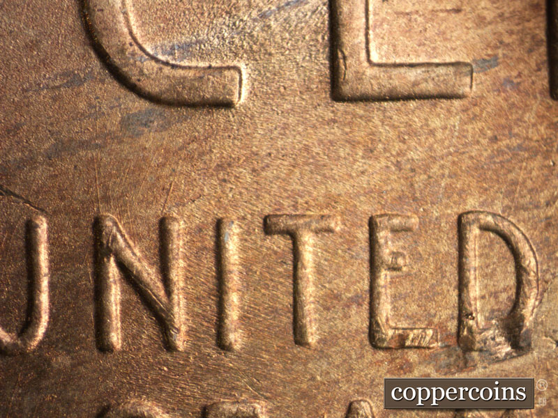 Die-stage B marker on 1949S•1MM•027 (1949 Repunched Mint Mark).