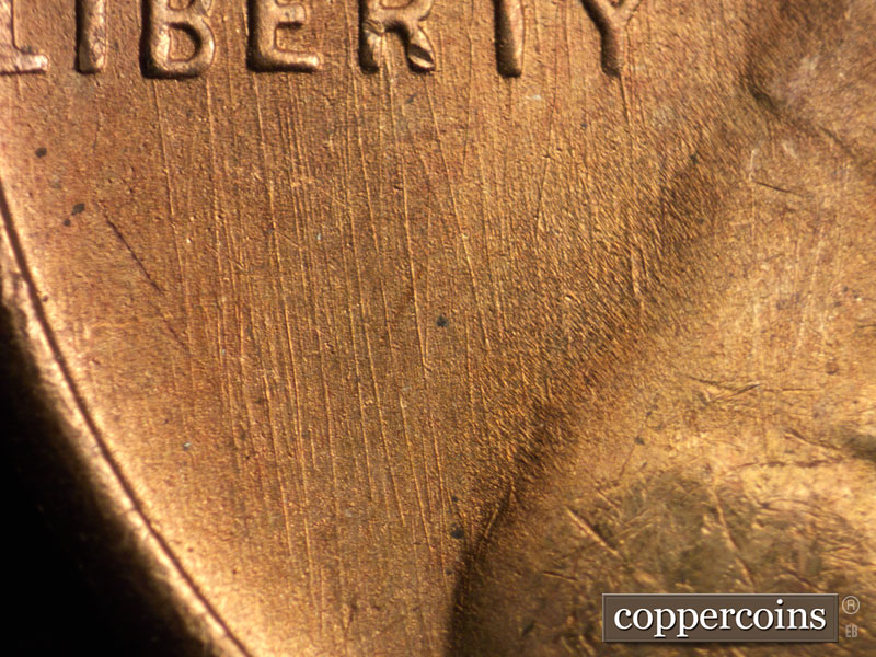 Die-stage B marker on 1949S•1MM•028 (1949 Repunched Mint Mark).