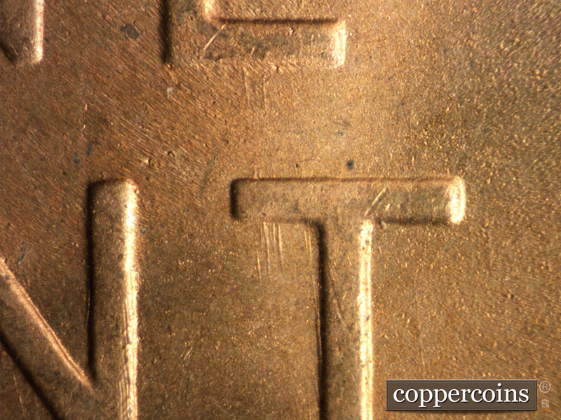 Die-stage B marker on 1949S•1MM•028 (1949 Repunched Mint Mark).