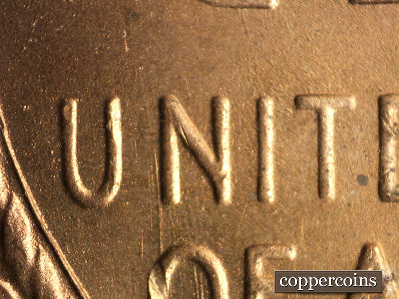 Die-stage B marker on 1949S•1MM•028 (1949 Repunched Mint Mark).