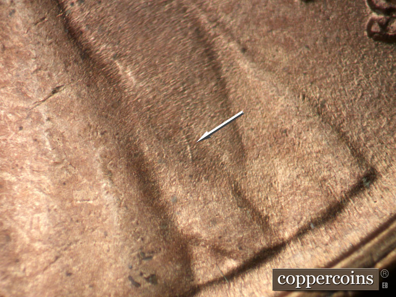 Die-stage B marker on 1949S•1MM•032 (1949 Repunched Mint Mark).