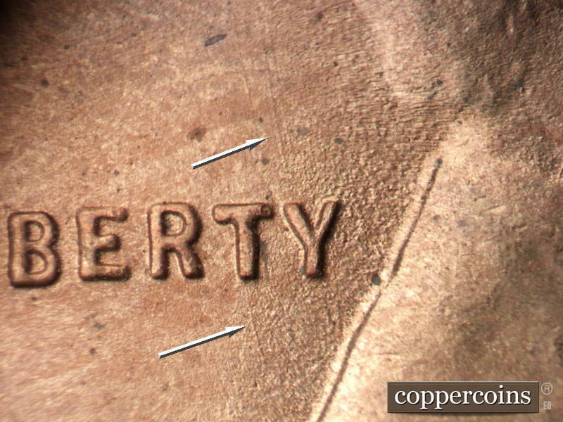Die-stage B marker on 1949S•1MM•032 (1949 Repunched Mint Mark).