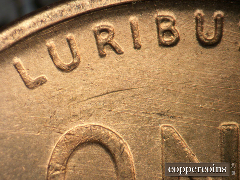 Die-stage B marker on 1949S•1MM•038 (1949 Repunched Mint Mark).