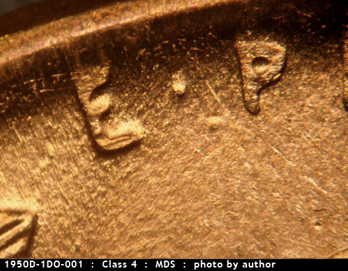 Die-stage B marker on 1950D•1DO•001 (1950 Doubled Die Obverse).