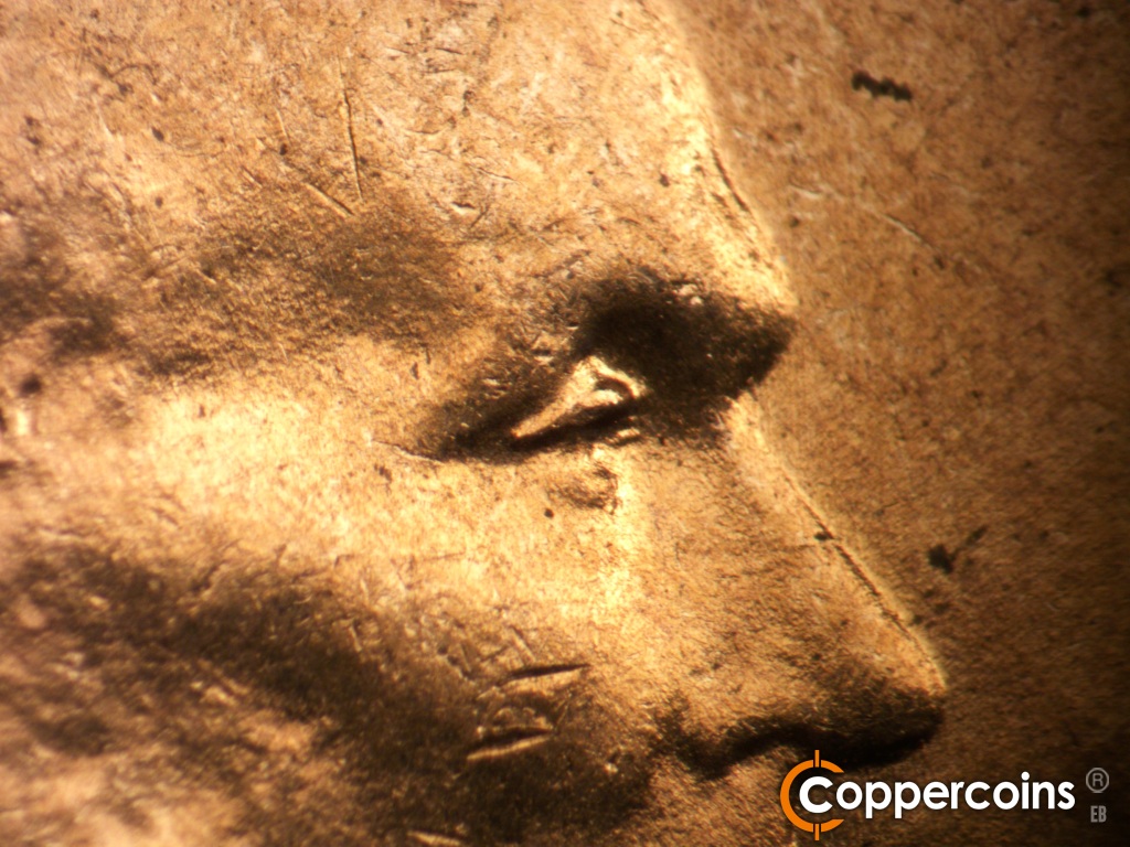 Die-stage B marker on 1950D•1DO•005 showing Extra upper eyelid south of primary.