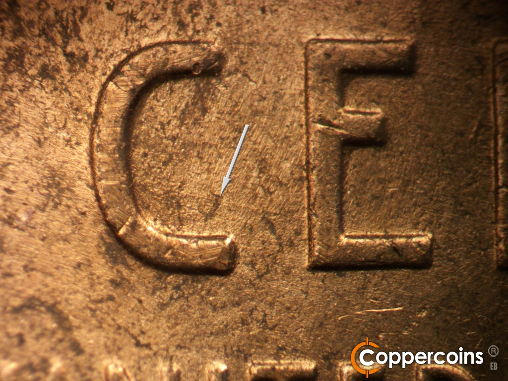 Die-stage B marker on 1950D•1DO•005 showing Light ESE die scratch from inside C to E in CENT.