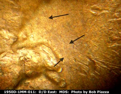 Die-stage B marker on 1950D•1MM•011 showing Die scratches at throat.