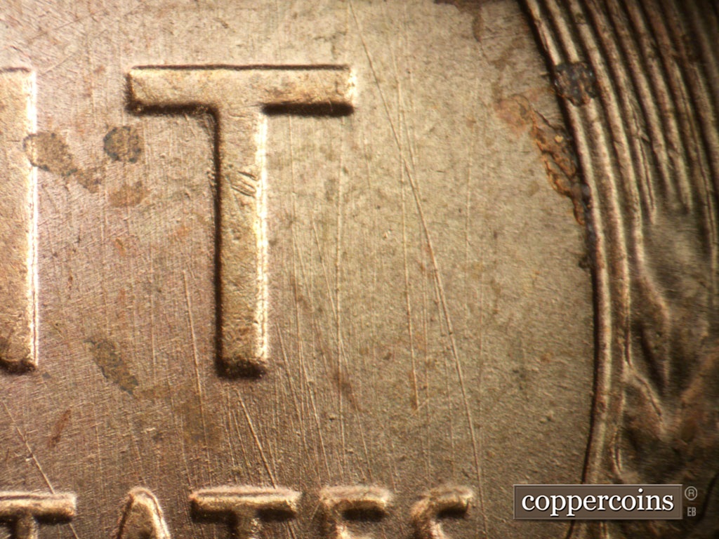 Die-stage A marker on 1950P•1DO•005 showing Heavy N/S die scratches near T in CENT.