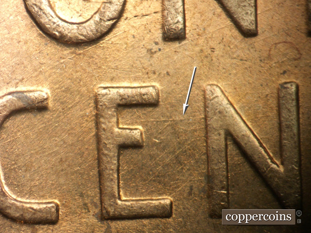 Die-stage A marker on 1950P•1DR•002 showing E/W die scratch connect EN of CENT. Die scratches throughout ONE CENT.