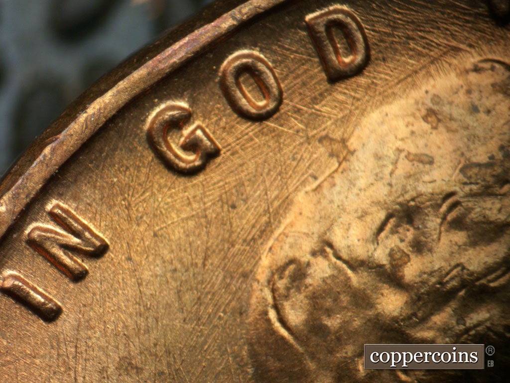 Die-stage A marker on 1950P•1DR•002 showing Heavy multidirectional die scratch through GOD.