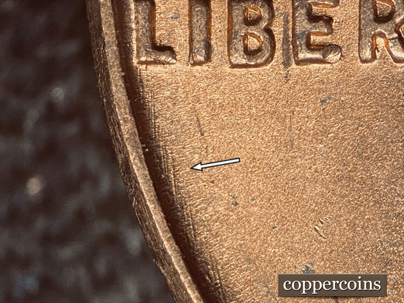 Die-stage B marker on 1951D•1DO•003 (1951 Doubled Die Obverse).